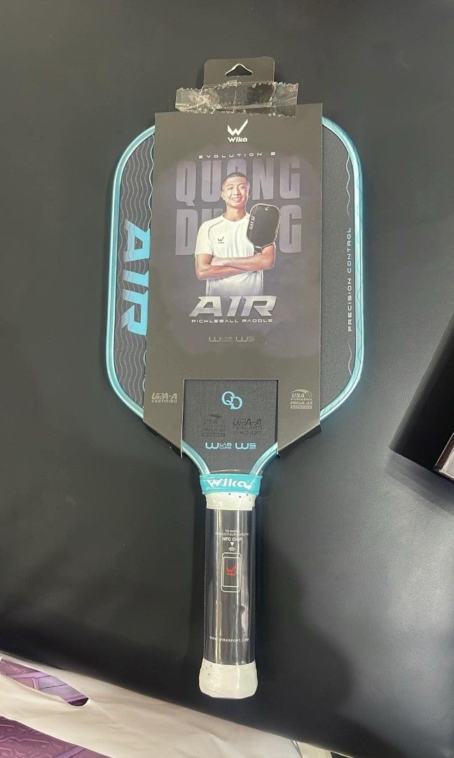 Wika QD Air 2 (Category: Racket and Ball Sports) located in Manila. Submitted by ajanessi (Listing ID 1464730909, Image 1). Description: with paddle case, grip, and edge guard.