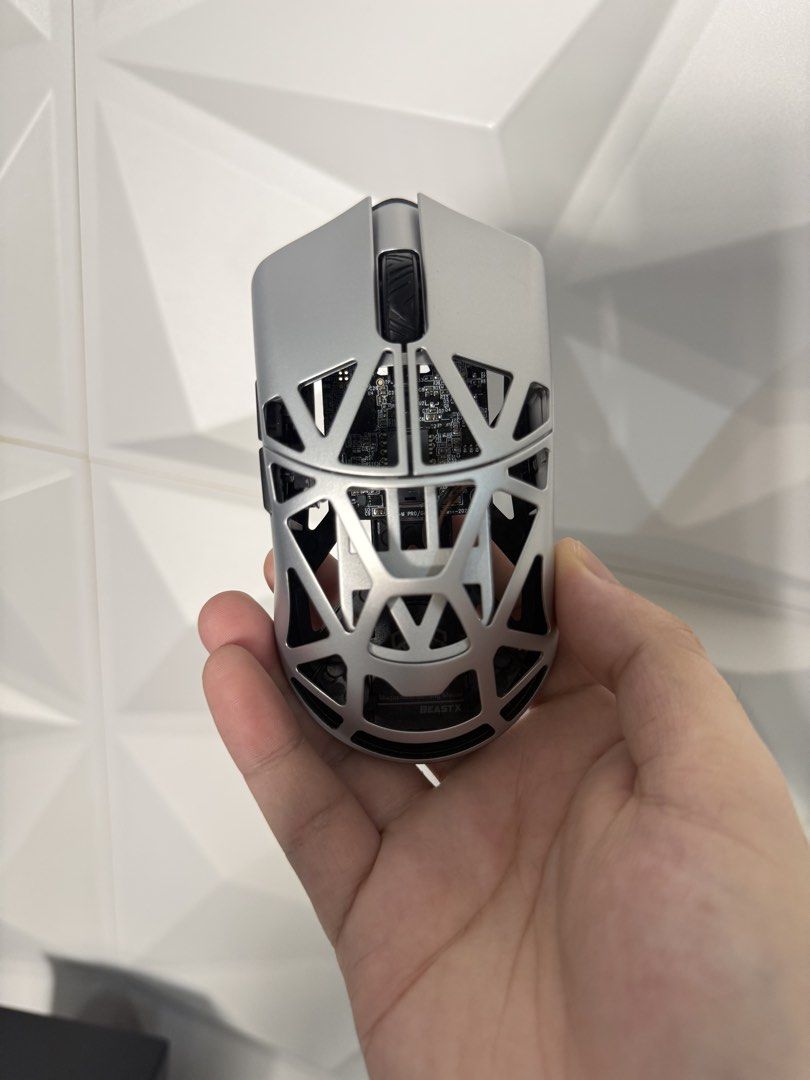 WLMOUSE Beast X PRO silver (Category: Mouse & Mousepads) located in Santa Maria. Submitted by xtian0825 (Listing ID 1464710286, Image 1). Description: - less than 20 games usage on valorant shape doesnt suit me (extra mouse on my collection) - got new Huan M and many more - Model: WLMOUSE Beast X Wireless Gaming Mouse - Color: Silver with black scroll wheel - Build: Ultra-lightweight magnesium alloy with honeycomb cutout design - Shape: Ergonomic