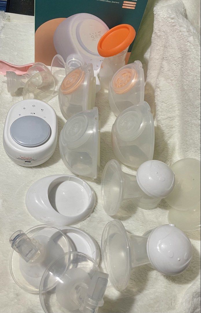 Wondermore Electric Breast Pump with Accessories (Category: Breastfeeding & Bottle Feeding) located in Manila. Submitted by imeejoy07 (Listing ID 1464582473, Image 3). Description: - Wondermore electric breast pump - Portable and easy to use - Digital display showing time and battery level - Includes multiple breast shields and accessories (as pictured) - Perfect for breastfeeding mothers.