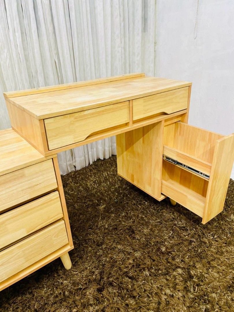 Wooden Dressing Table with Mirror and Storage (Category: Tables & Sets) located in Antipolo. Submitted by roselle001 (Listing ID 1464646642, Image 3). Description: - Solid wood construction for durability - Large, clear mirror for your reflection - Ample storage with multiple drawers and a cabinet - Beautiful, natural wood grain - Sturdy legs for stability - Perfect for organizing makeup and accessories.