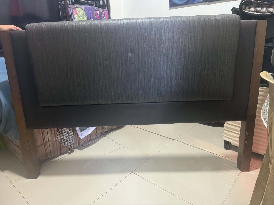 Wooden Headboard with Upholstered Panel HEAD BOARD (Category: Bed Frames & Mattresses) located in Manila. Submitted by whatalife. (Listing ID 1464597885, Image 1). Description: Wooden headboard with a dark grey upholstered panel. The frame is made of wood. The back is covered with black fabric. It has a modern design. Good for a queen or king size bed. Measures about 60 inches wide..