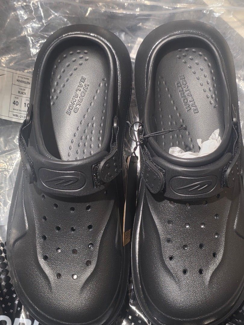 World Balance Hoversleek Black Clogs Size 40 (Category: Slippers and slides) located in Angeles City. Submitted by ace_ce (Listing ID 1464739980, Image 1). Description: - Brand: World Balance Hoversleek - Color: Black - Size: EUR 40 / US 10 - Condition: Brand new with tags attached, unwrapped from original packaging - Features: Slip-on design, adjustable strap, ventilation holes, textured grip inner sole with logo.