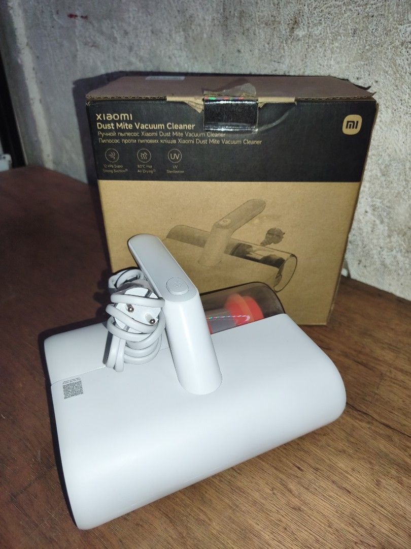 Xiaomi Dust Mite Vacuum Cleaner (Category: Vacuum Cleaner & Housekeeping) located in Manila. Submitted by tinbarbacena15 (Listing ID 1464591783, Image 1). Description: Standard / Gen 1 (MJCMY02DY / MJCMY02EU): Features a 350W motor, 12,000Pa cyclone suction, 12,000 beats/minute tapping, 50°C hot-air drying, and a 3-to-4 layer filtration system. Weighs about 1.63kg **Used only less than 10 times, bought last February 2026 Core Features High-Freque