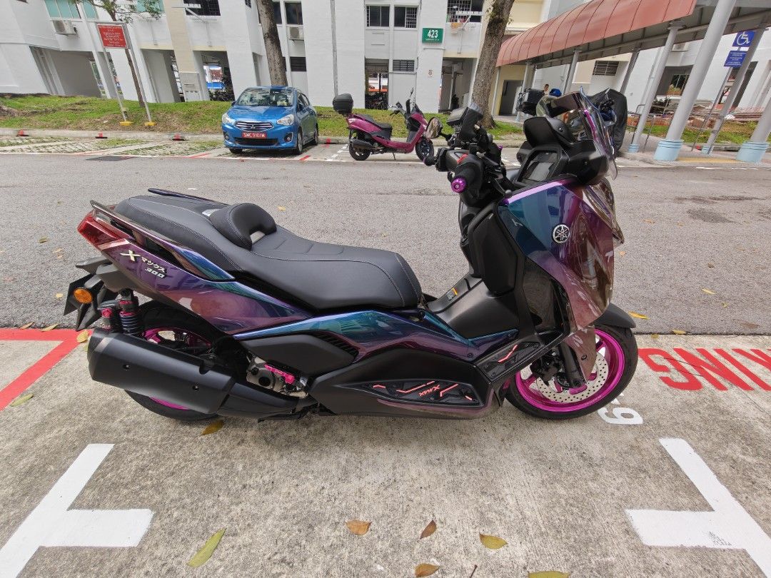 XMAX VERSION 3 (Category: Motorcycle Accessories) located in Singapore. Submitted by bintegarep84 (Listing ID 1464580470, Image 1). Description: I spray this colour 3 days ago and didn't like it. it's a 4 tone colours, which consist of Purple,Blue,gold and green. I'm selling at a loss. no nego. it's more to men colour I guess. 😅😅.