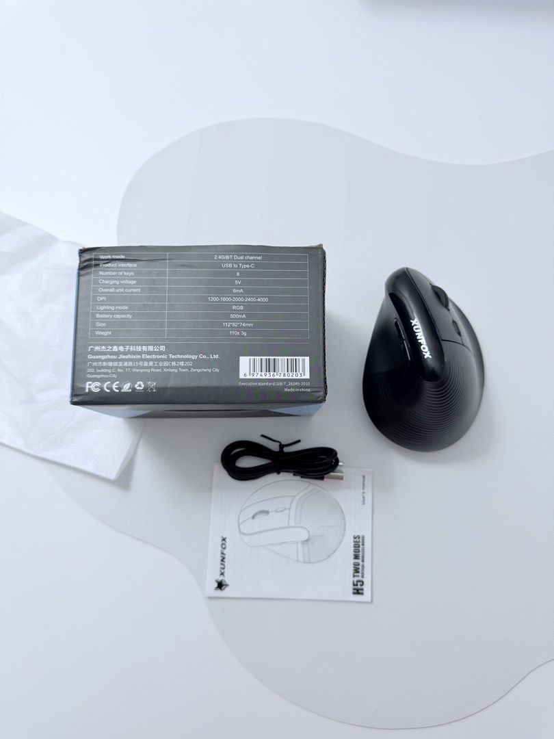 Xunfox H5 Wireless Vertical Ergonomic Mouse (Category: Mouse & Mousepads) located in Manila. Submitted by yeyouchengdu_ (Listing ID 1464574194, Image 3). Description: • Dual Connectivity: 2.4G Wireless & Bluetooth • Rechargeable via USB Type-C • Adjustable DPI: 1200, 1600, 2400 • Includes USB-C charging cable and user manual •Designed for ultimate comfort during extended computer sessions FOR DETAILS, PLEASE DO A RESEARCH 🤍 All are new~ Only use