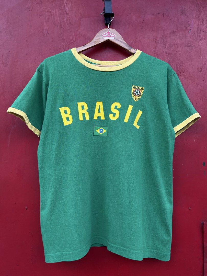 Y2K Brasil Soccer Ringer shirt (Category: Tshirts & Polo Shirts ) located in Cavite. Submitted by thriftniowen (Listing ID 1464729299, Image 1). Description: Y2K Brasil Soccer Ringer shirt Size Medium Chest: 20.5 Length: 26.5 Great condition! Flaws: color rate, stain and print.