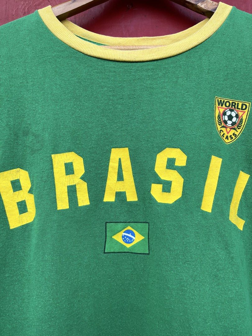 Y2K Brasil Soccer Ringer shirt (Category: Tshirts & Polo Shirts ) located in Cavite. Submitted by thriftniowen (Listing ID 1464729299, Image 2). Description: Y2K Brasil Soccer Ringer shirt Size Medium Chest: 20.5 Length: 26.5 Great condition! Flaws: color rate, stain and print.