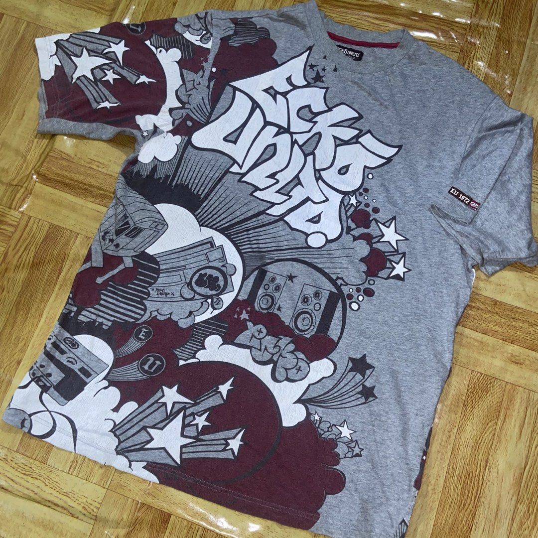 Y2k Ecko Unltd Graffiti Shirt (Category: Tshirts & Polo Shirts ) located in Dasmarinas. Submitted by thrift2gems (Listing ID 1464588416, Image 3). Description: Y2k Ecko Unltd Graffiti Shirt✨ -WIDTH: 22.5 -LENGTH: 30 -COLOR RATE: 9/10 -CONDITION: 9/10 -ISSUE: CRACKPRINTS , NEED WASH.