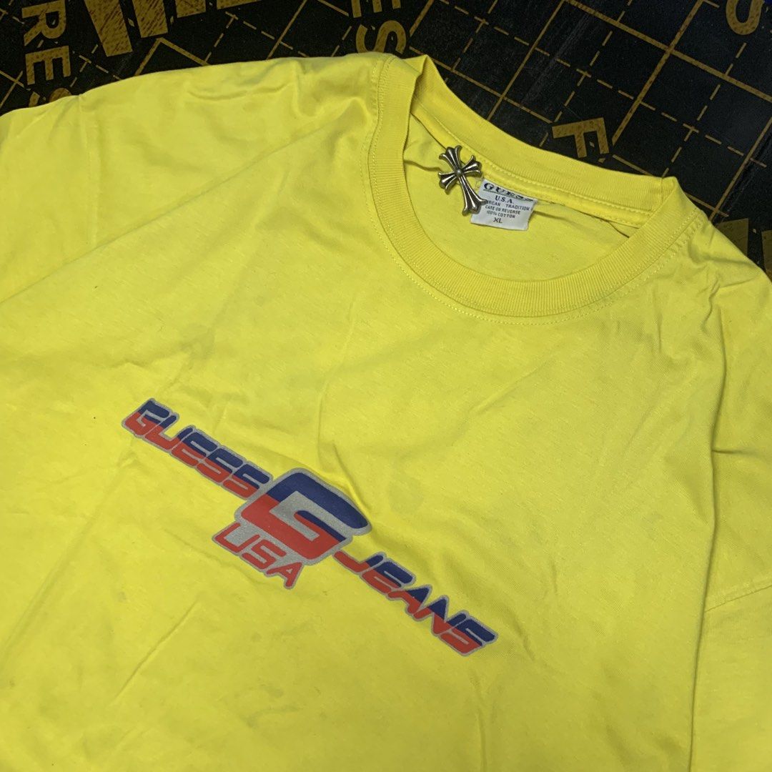 Y2k Guess Tee (Category: Tshirts & Polo Shirts ) located in Manila. Submitted by vanmeds (Listing ID 1464643574, Image 1). Description: y2k Guess Tee 22 width 27 length issue: flaws 📍Manila.