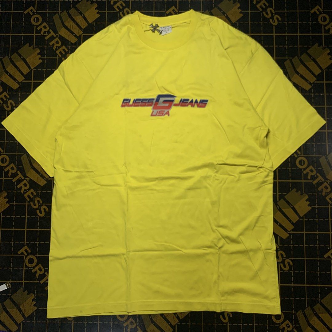 Y2k Guess Tee (Category: Tshirts & Polo Shirts ) located in Manila. Submitted by vanmeds (Listing ID 1464643574, Image 2). Description: y2k Guess Tee 22 width 27 length issue: flaws 📍Manila.