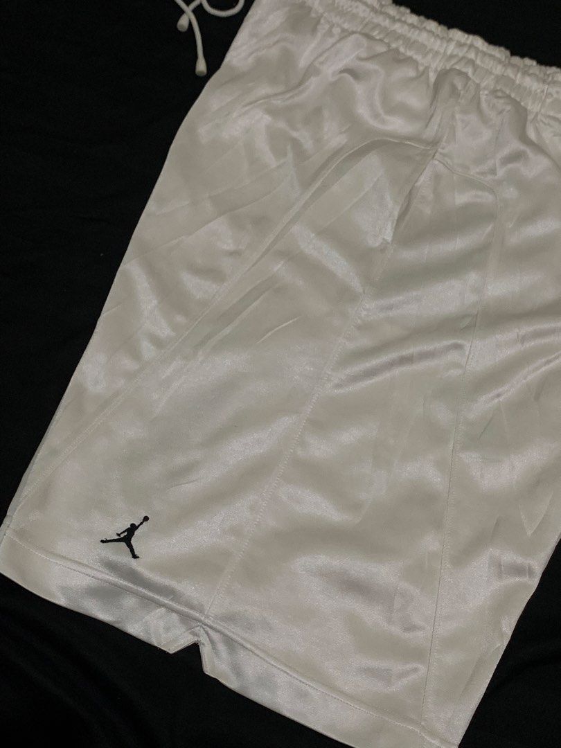 Y2k Jordan White (Category: Shorts) located in Roxas City. Submitted by vaultcultureco. (Listing ID 1464677122, Image 1). Description: - Y2k Jordan White shorts - Smooth satin material for comfort - Elastic waistband with adjustable drawstring - Features the iconic Jumpman logo - Versatile for basketball or casual wear -issue: see last 2pics Washable dirt stain Sa may strings .
