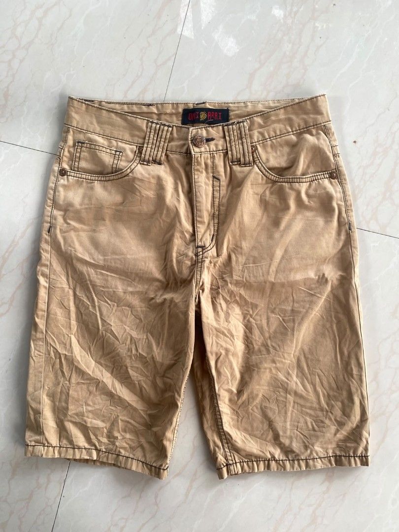 Y2k Oniarai (Category: Shorts) located in Santo Tomas. Submitted by liyothrift (Listing ID 1464703427, Image 1). Description: Y2k Oniarai japan khaki-colored cargo shorts featuring a distinctive blue and gold flame or oni mask embroidery. Waist: 32 Length: 22 Leg opening: 9 Color: 10/10 Excellent to as new free ship No issue 📩📩📩.
