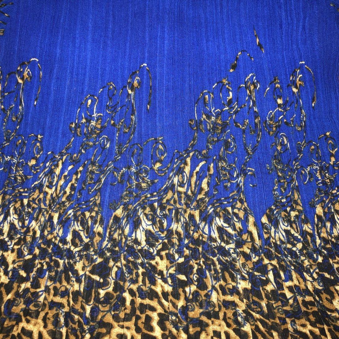 Y2K Pleated button down leopard design (Category: Dresses) located in Dasmarinas. Submitted by cornyxmessy (Listing ID 1464587245, Image 3). Description: .