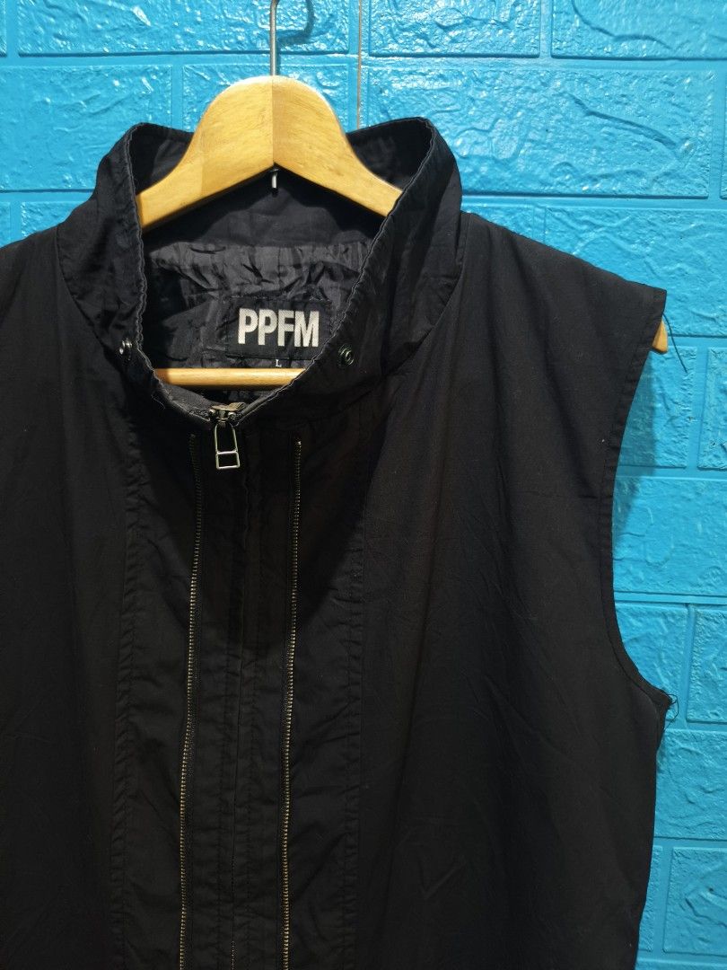 Y2k PPFM Black long vest (Category: Vests) located in Davao. Submitted by vndrgd (Listing ID 1464617798, Image 2). Description: - Black PPFM vest jacket - Size: L - Measurements: 21" width, 32" length - High-quality YKK zippers - Adjustable drawstring at the hem - Ideal for layering - Condition: 8.5/10 (Good).