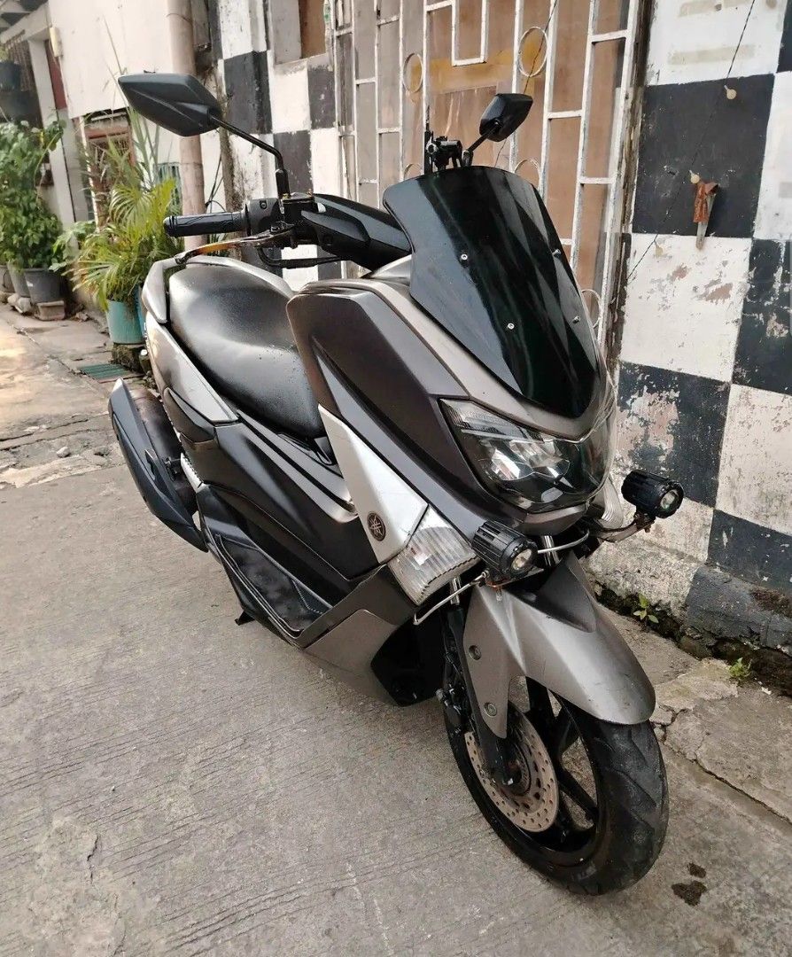 Yamaha NMAX V1 (Category: Motorbikes for Sale) located in Manila. Submitted by chinito2.0 (Listing ID 1464610351, Image 1). Description: 📌 Unit Details ❗❗❗FOR SALE ❗❗❗ - Model: 2019 Yamaha NMAX V1 ​ - Price Asked: ₱ 75k - May bawas pa! Tara usap tayo ​ - Mileage: 38,000 km ​ - Specs/Condition: ✅ All stock engine ✅ 1st owner, original plate, registered until next year ✅ Add-ons: driving light, loudhorn ✅ Running condition: good, ready to 𝐮𝐬𝐞 ⚠