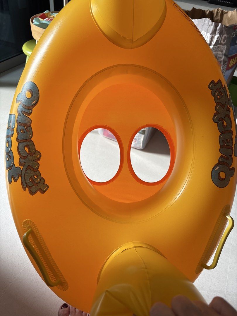 Yellow Duck Inflatable Float Ring (Category: Kids Toys) located in Singapore. Submitted by sweetclearance (Listing ID 1463744366, Image 3). Description: - small float for kids - Adorable yellow duck floaty - Features 'Quackers Float' text - Ideal for pool or beach fun - Great for kids and adults - Simple to inflate and deflate - Get ready for a splashing good time this summer!.