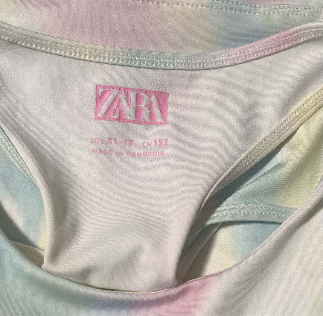 ZARA (Category: Babies & Kids Fashion) located in Davao. Submitted by sart0ria85 (Listing ID 1464748595, Image 3). Description: A sleeveless top in pastel abstract. Fabric details are removed. Stretchable. MADE IN CAMBODIA 🇰🇭 11-12 YEARS OLD SIZING EXCELLENT CONDITION (95/100).