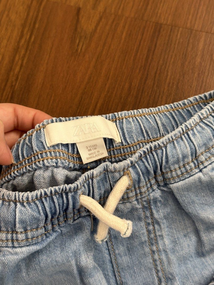Zara Kids Denim Shorts Bundle (Size 3 Years) (Category: Babies & Kids Fashion) located in Manila. Submitted by nolanandpio (Listing ID 1464677628, Image 2). Description: - Bundle of 2 Zara denim shorts - Size: 3 years - Light wash with drawstring - Dark wash with distressed details - Perfect for everyday wear - Made in Bangladesh.