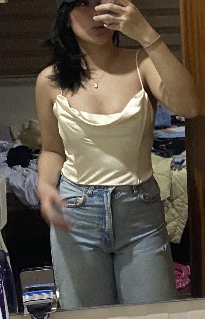 Zara White Satin Corset Crop Top (Category: Sleeveless) located in Cebu City. Submitted by stayseesells (Listing ID 1464366527, Image 3). Description: - Zara white satin corset crop top - Adjustable spaghetti straps - Brand new, never worn - Versatile: dress up or down with jeans or a skirt.