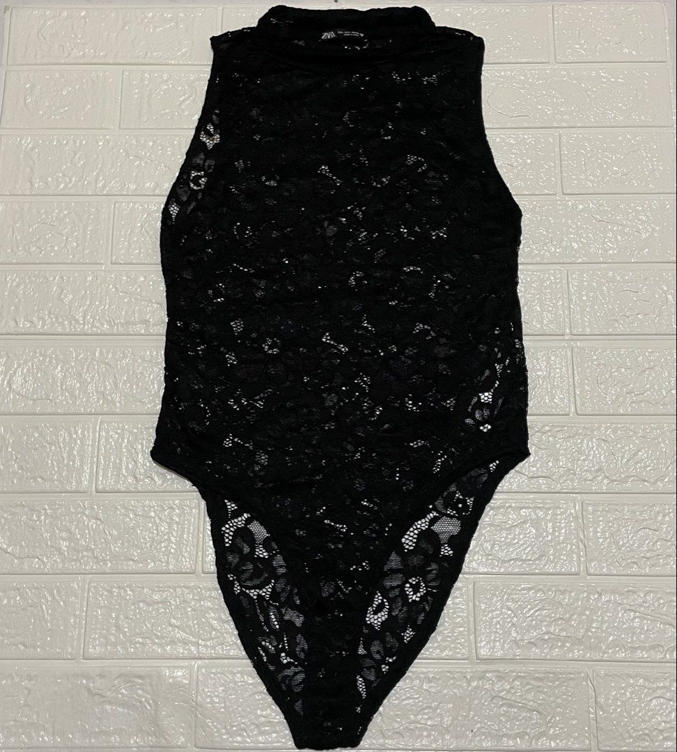 Zara Lace Mock Neck Bodysuit (Category: Sleeveless) located in Marilao. Submitted by clear_out_closet (Listing ID 1464626266, Image 1). Description: Item Details: 👇 • Brand: Zara • Color: Black • Material: 92% Polyamide (Nylon), 8% Elastane • Country of Origin: Made in China • Sizing: EUR L / USA L / MEX 30 • Original Retail Price (SRP): ₱1,795 • Condition Note: Pre-loved in excellent condition with delicate floral lace fabric, high mock necklin
