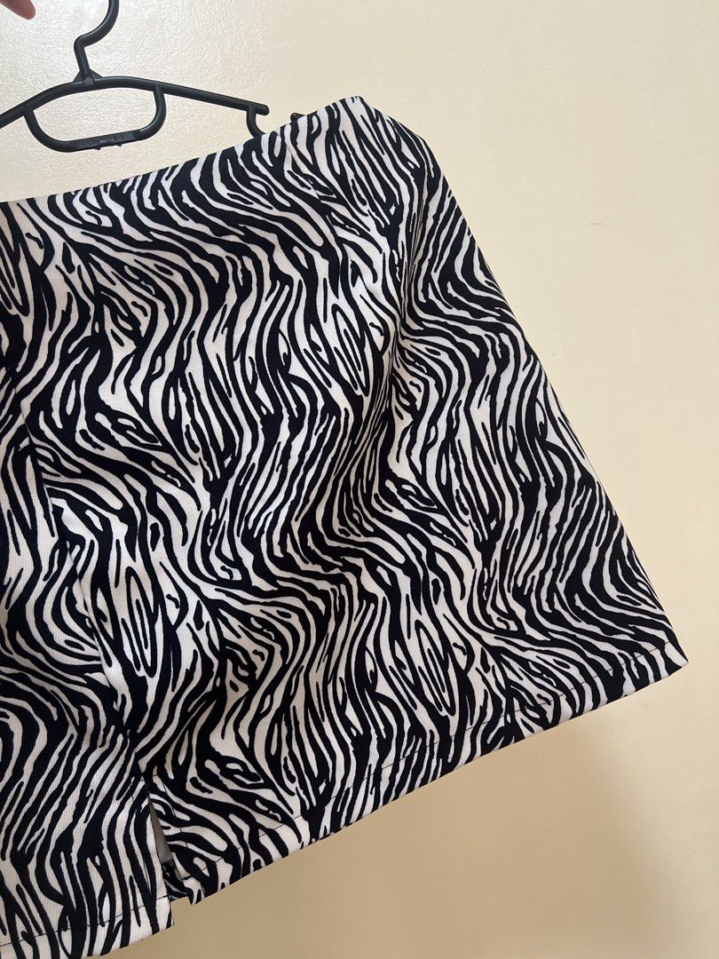 Zebra Print Party Skirt (Category: Shorts) located in Daet. Submitted by k.declutterz (Listing ID 1464640982, Image 1). Description: Wore once! - Trendy black and white zebra print - Flattering high-waisted fit - Versatile for a bold, casual look - Easy to style with plain tops.