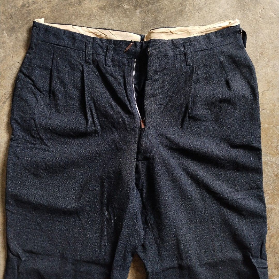 1950s Mitsukoshi Drop Loop Wool Pleated Trousers (Talon zipper) (Category: Trousers) located in Bulacan. Submitted by hustleoverluckphv2 (Listing ID 1464870378, Image 2). Description: 1950s Mitsukoshi Drop Loop Wool Pleated Trousers (Talon zipper) Measurements Waist - 35" Length - 38" Hem - 9" Thigh - 13" Inseam - 27" Php 490.