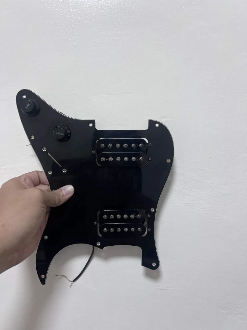 1984 Dragster 04H Humbucker Pickup Set (Category: Musical Instruments) located in Carmona. Submitted by r.redone (Listing ID 1464776517, Image 1). Description: 1984 Fender Dragster 04H Humbucker Pickup Set From a 1984 Fender Contemporary Series Stratocaster, Made in Japan. Bridge: 13kΩ Neck: 12kΩ Magnets: Alnico V (if I’m not mistaken) Comes with the original pickguard, pots, and capacitor Pickup selector switch is NOT included Pickguard mounting