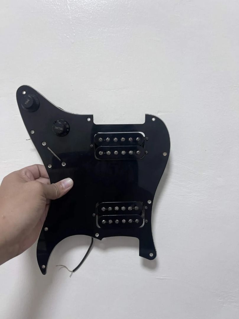 1984 Dragster 04H Humbucker Pickup Set (Category: Musical Instruments) located in Carmona. Submitted by r.redone (Listing ID 1464776517, Image 2). Description: 1984 Fender Dragster 04H Humbucker Pickup Set From a 1984 Fender Contemporary Series Stratocaster, Made in Japan. Bridge: 13kΩ Neck: 12kΩ Magnets: Alnico V (if I’m not mistaken) Comes with the original pickguard, pots, and capacitor Pickup selector switch is NOT included Pickguard mounting