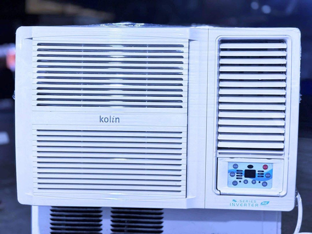 1HP KOLIN Full Inverter Air Conditioner (Category: Air Conditioning and Heating) located in Manila. Submitted by almira_03 (Listing ID 1464887091, Image 1). Description: - Brand: Kolin - Type: Window-type inverter air conditioner - Color: White - Control: Digital control panel with clear display and button interface - Design: Compact rectangular unit with front louver vents, ideal for wall or window installation - Performance: Cools rooms efficie