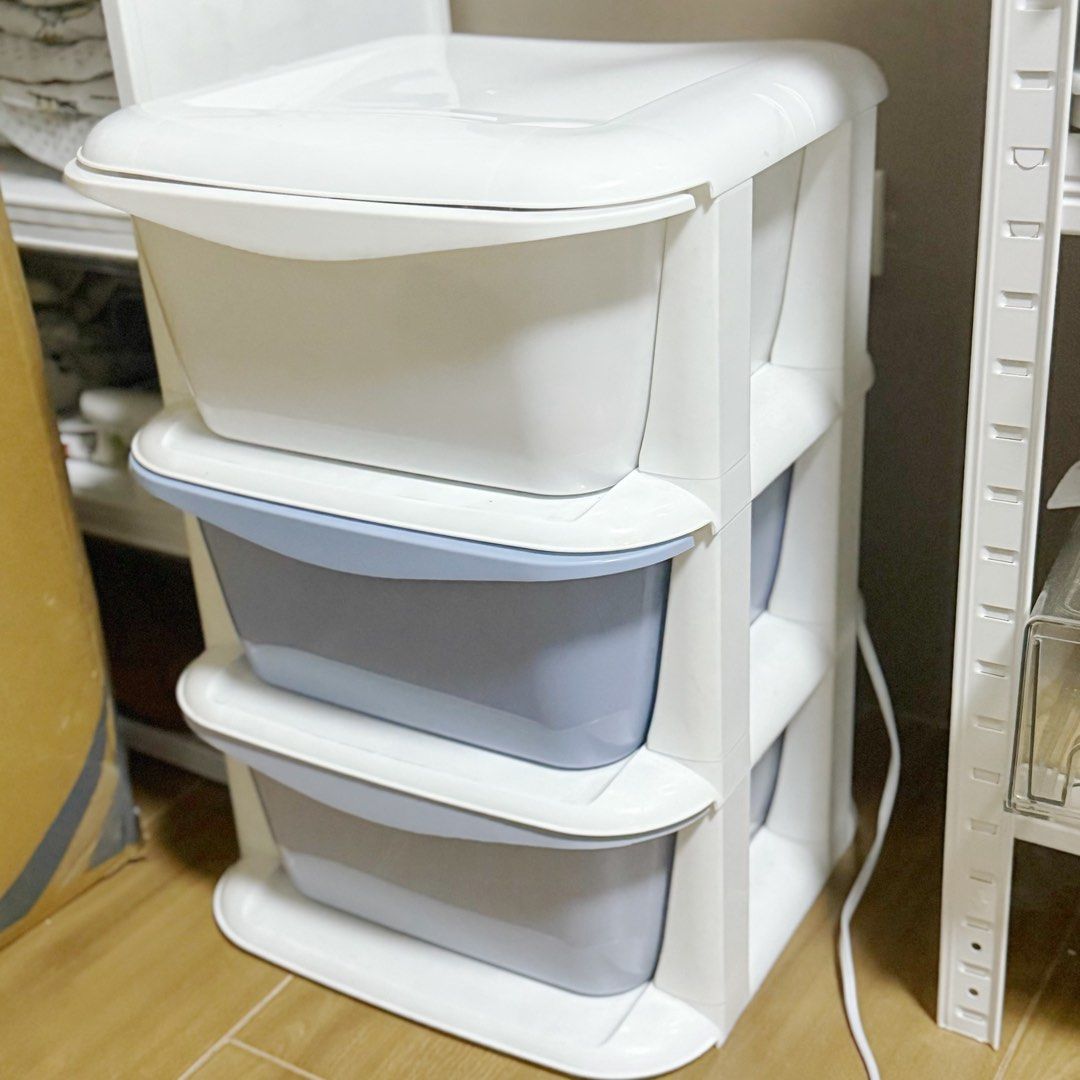 3-Tier Plastic Storage Drawer Unit White and Blue (Category: Shelves, Cabinets & Racks) located in Marikina City. Submitted by lovegoeson (Listing ID 1464891796, Image 2). Description: - 3-tier plastic storage unit for home organization - 1 solid white top drawer and 2 light blue bottom drawers - Sturdy white frame with smooth sliding drawers - Ideal for clothes, toys, and miscellaneous items - Clean and minimalist look.