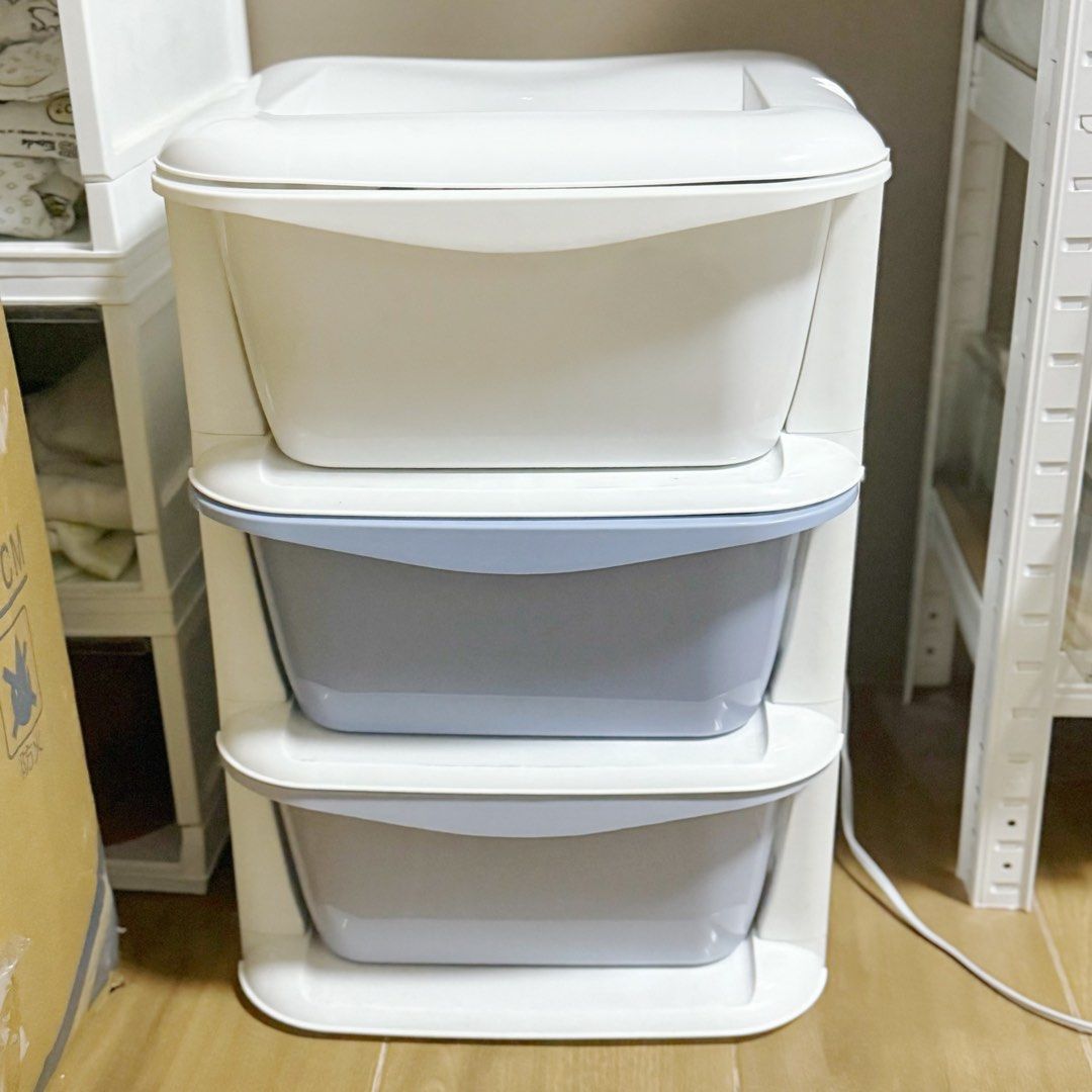 3-Tier Plastic Storage Drawer Unit White and Blue (Category: Shelves, Cabinets & Racks) located in Marikina City. Submitted by lovegoeson (Listing ID 1464891796, Image 1). Description: - 3-tier plastic storage unit for home organization - 1 solid white top drawer and 2 light blue bottom drawers - Sturdy white frame with smooth sliding drawers - Ideal for clothes, toys, and miscellaneous items - Clean and minimalist look.