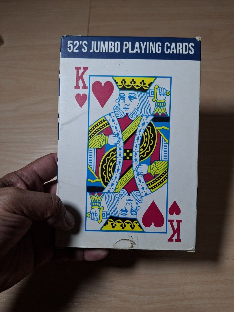 52's Jumbo Playing Cards Oversized Deck (Category: Board Games & Puzzles) located in Baguio. Submitted by restyrille77846 (Listing ID 1464891574, Image 1). Description: - Authentic Kmart oversized jumbo playing cards - Ideal for parties, magic tricks, and fun card games - Features a stylish blue and white patterned back design - Original cardboard box included (box shows minor shelf wear) - Cards are clean and well-maintained.