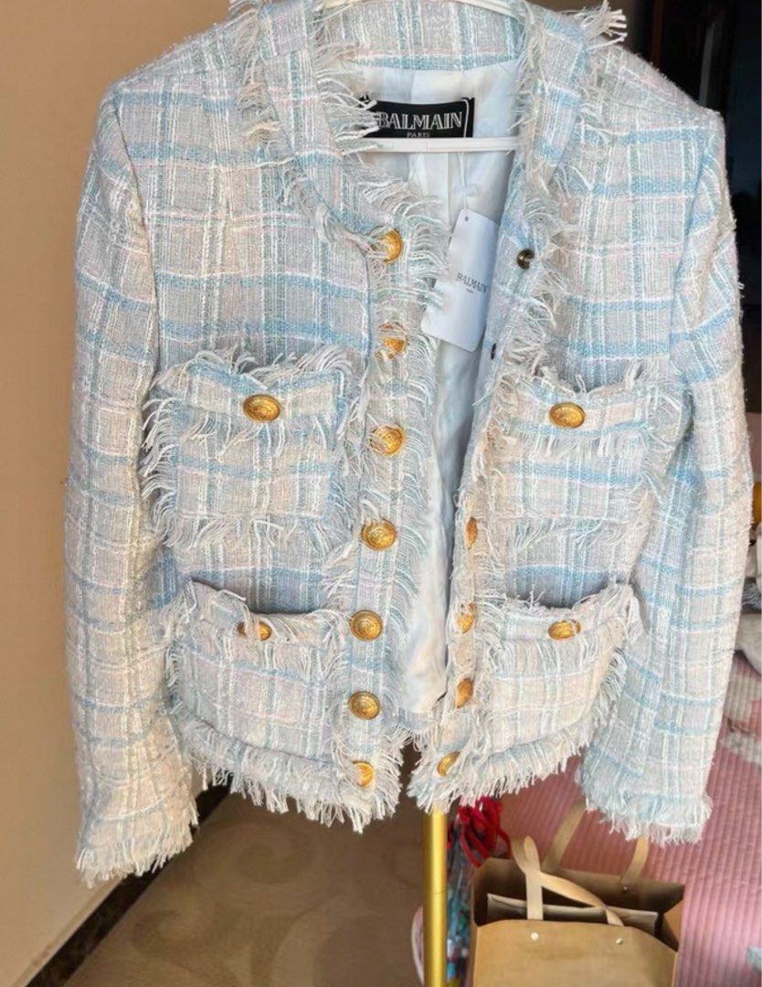 5#85 Balmain Tweed Jacket size M balman (Category: Coats, Jackets and Outerwear) located in Manila. Submitted by richru (Listing ID 1464922181, Image 2). Description: - Authentic Balmain tweed jacket in light blue, pink, and white plaid - Brand new with original hanging tag still attached - Features iconic gold embossed buttons on the front and pockets - Chic frayed raw edges and fully lined in white fabric - Material: Cotton, acrylic, polyamide,