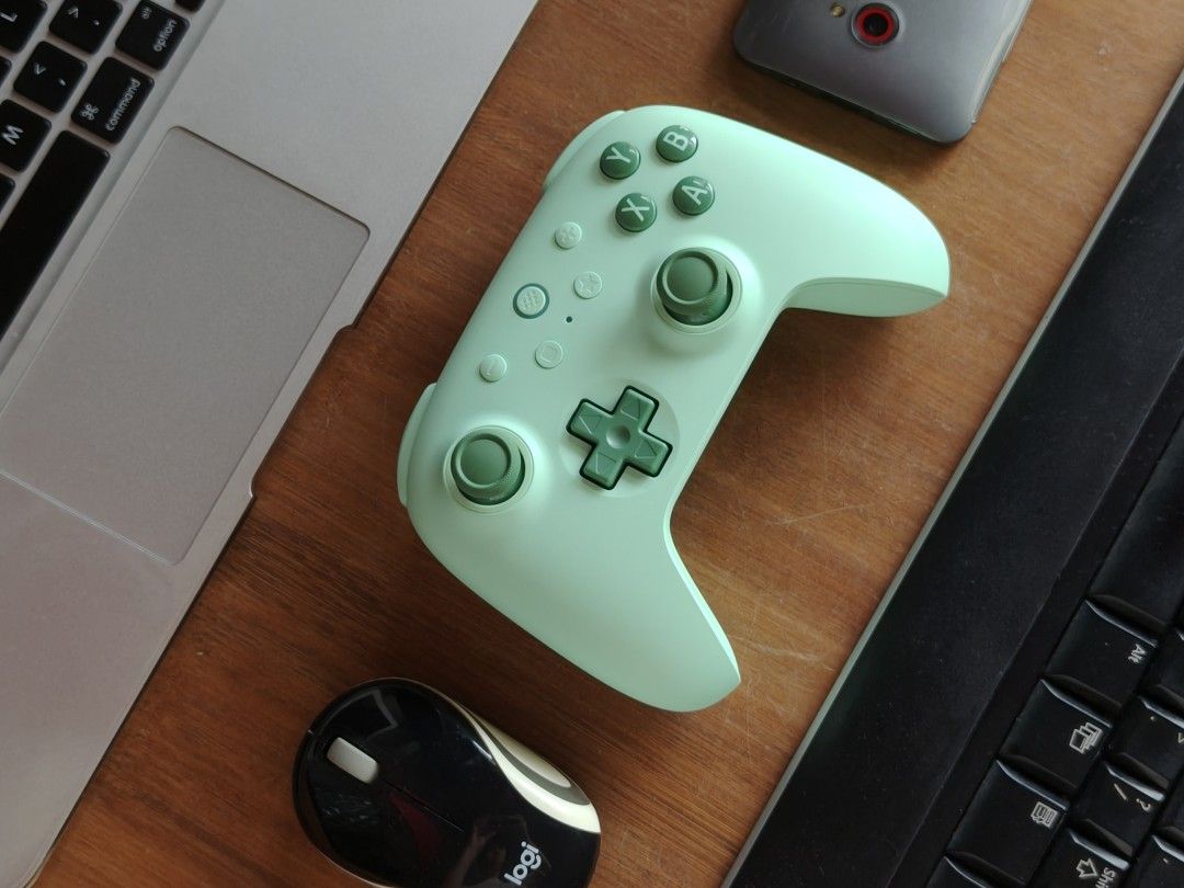 8BitDo Ultimate 2C Wireless Controller (Category: Controllers) located in Singapore. Submitted by dippercopper (Listing ID 1464806603, Image 1). Description: - Model: 8BitDo Ultimate 2C Wireless Controller - Color: Mint Green - Compatibility: Windows and Android - Condition: Like-new - Bought this in 26 Dec 2025. Used it a few times. - Included: 2.4G USB adapter, USB-C cable, Manual, and Original box. - Meetup & Cash payments only.