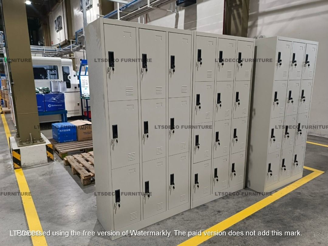 9 DOOR STEEL LOCKER (Category: Office Furniture & Fixtures) located in Caloocan City. Submitted by talaltsdeco (Listing ID 1464823537, Image 3). Description: - Product: 9 Door Steel Locker - Color: Neutral Gray / Beige - Material: Heavy-duty cold-rolled steel for maximum durability - Security: Individual cam locks with keys included for each of the 9 compartments - Ventilation: Built-in air vents on each door to keep stored items fresh - Applicat
