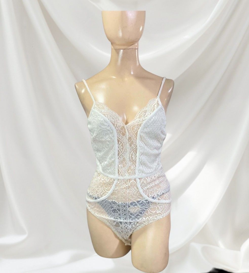 🌸 BLĀSHE Elegant Multi-Patterned White Lace Bodysuit 🌸 (Category: Undergarments & Loungewear) located in Caloocan City. Submitted by saturday.ph (Listing ID 1464803905, Image 2). Description: This garment is an elegant, multi-patterned white lace bodysuit styled as a lingerie piece or statement camisole top. It features a beautiful combination of geometric fishnet-style lace paneling on the upper bodice, mixed with delicate floral lace overlay 