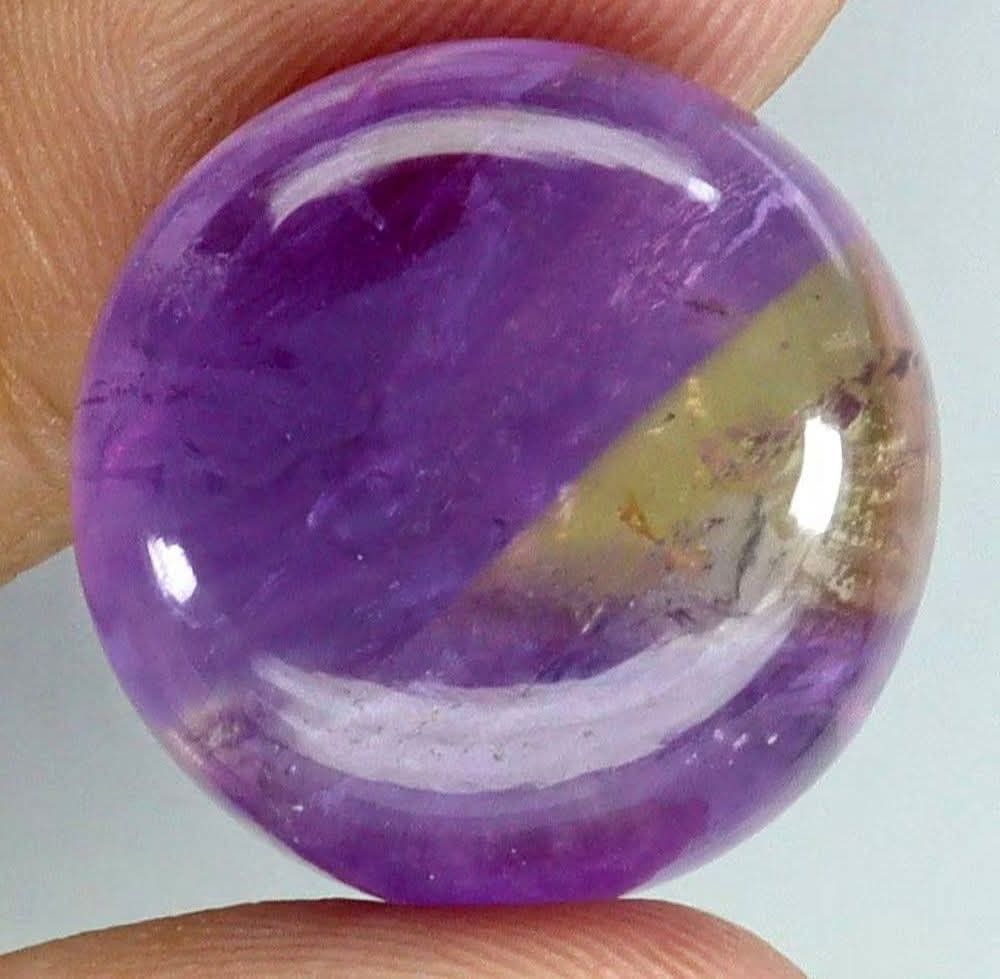 💯 Natural AMETRINE loose (Category: Precious Stones) located in Kawit. Submitted by authentic_gemstones_byalton (Listing ID 1464964783, Image 1). Description: AVAILABLE ❗ 💯 NATURAL AMETRINE LOOSE ▪️25.2 carats ▪️18.0x18.0x9.0(mm) dimension ▪️Round cabochon cut ▪️SI (clarity) ▪️Unheated/untreated ▪️7.0 (hardness) ▪️(Brazil) origin ▪️100% brand new item #ametrine #gemstones #AuthenticGemstonesbyALTON.