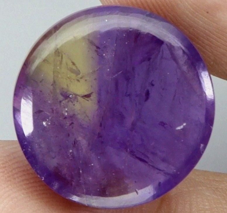💯 Natural AMETRINE loose (Category: Precious Stones) located in Kawit. Submitted by authentic_gemstones_byalton (Listing ID 1464964783, Image 2). Description: AVAILABLE ❗ 💯 NATURAL AMETRINE LOOSE ▪️25.2 carats ▪️18.0x18.0x9.0(mm) dimension ▪️Round cabochon cut ▪️SI (clarity) ▪️Unheated/untreated ▪️7.0 (hardness) ▪️(Brazil) origin ▪️100% brand new item #ametrine #gemstones #AuthenticGemstonesbyALTON.