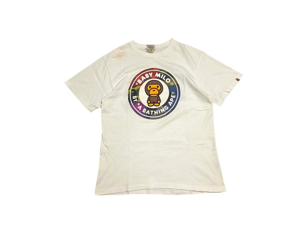 A Bathing Ape Baby Milo Grid Camo (Category: Tshirts & Polo Shirts ) located in Manila. Submitted by southstreethub.ph (Listing ID 1464896862, Image 1). Description: - A Bathing Ape Baby Milo Grid Camo - Size: Medium (tag inside collar) - Dimention: 19.5 Width 27.5 Lenght - Details: Signature ape head logo tag on left sleeve hem, includes woven neck tags - Material: 100% cotton, short sleeves - Condition: Good, with minor yellowing/staining near 