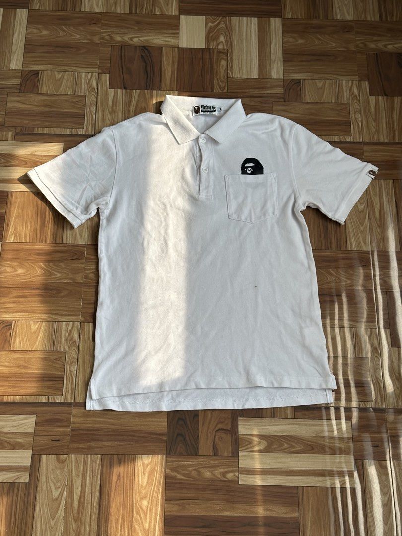 A Bathing Ape Polo Shirt (Category: Activewear) located in Manila. Submitted by aledobrian29085 (Listing ID 1464780319, Image 1). Description: Dimes: Width: 22 Length: 28 Size: M.