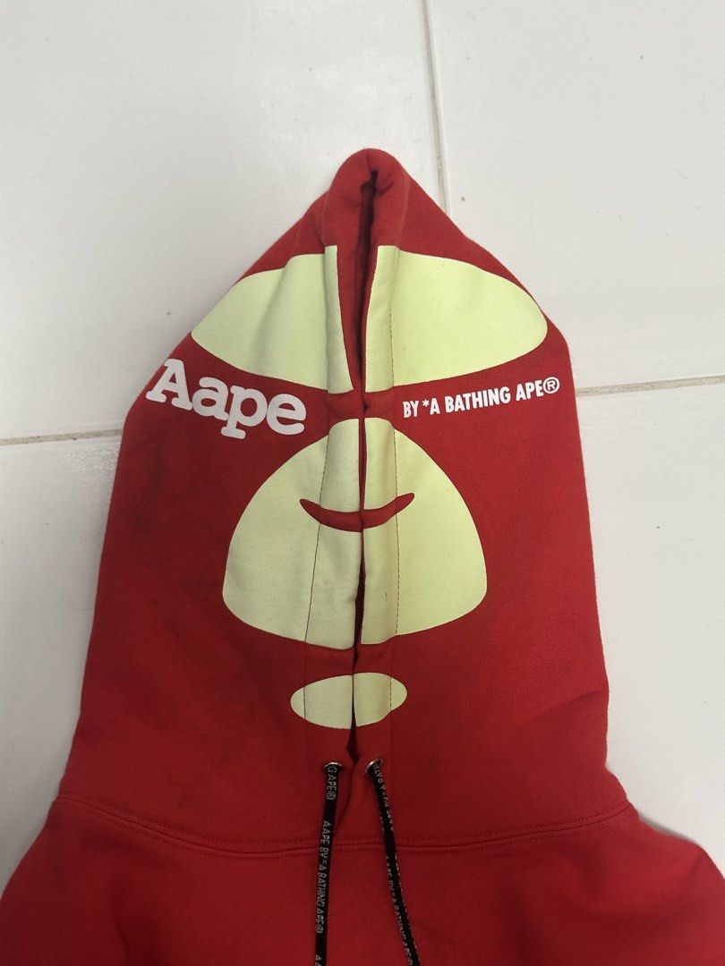 AAPE by A Bathing Ape Moonface Pull Over Hoodie (Category: Coats, Jackets and Outerwear) located in Cavite. Submitted by PRIVATE.Selection (Listing ID 1464810185, Image 3). Description: AAPE by A Bathing Ape Moonface Pull Over Hoodie Size M-L W- 21 L- 28 Good as new Needs wash only.