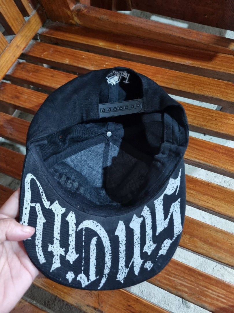 Academy Fits Studded Snapback Cap Black (Category: Caps & Hats) located in Baguio. Submitted by phoeberose33384 (Listing ID 1464814611, Image 2). Description: - Brand: Academy Fits - Style: Black snapback cap with edgy streetwear vibe - Details: Heavy front stud detailing with gothic-style embroidered lettering - Brim: Structured brim featuring the authentic holographic sticker - Closure: Adjustable plastic snapback at the back - Condition: Clean