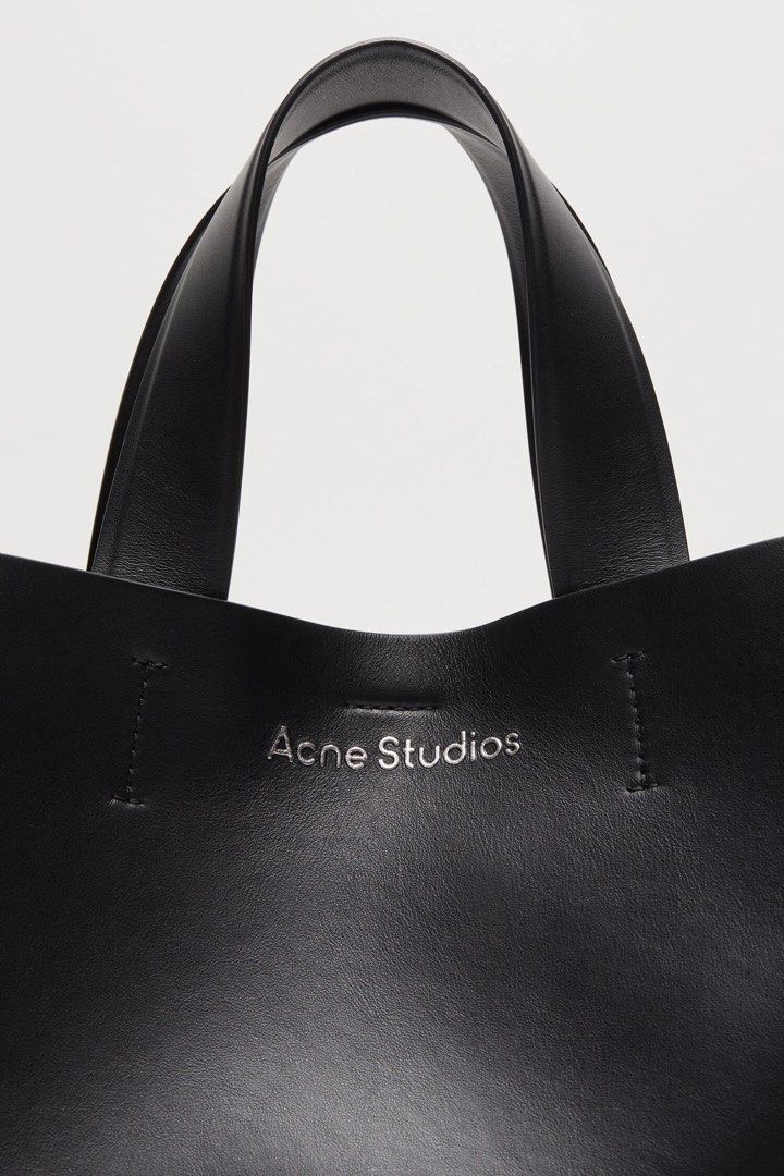 Acne Studios Musubi Tote Bag - Black (Category: Tote Bags) located in Balanga. Submitted by kyleweeee (Listing ID 1464948076, Image 3). Description: Bought this bag from another seller here on Carousell. Selling it as I no longer use it. Please message me if you’d like more photos or details. Nga..