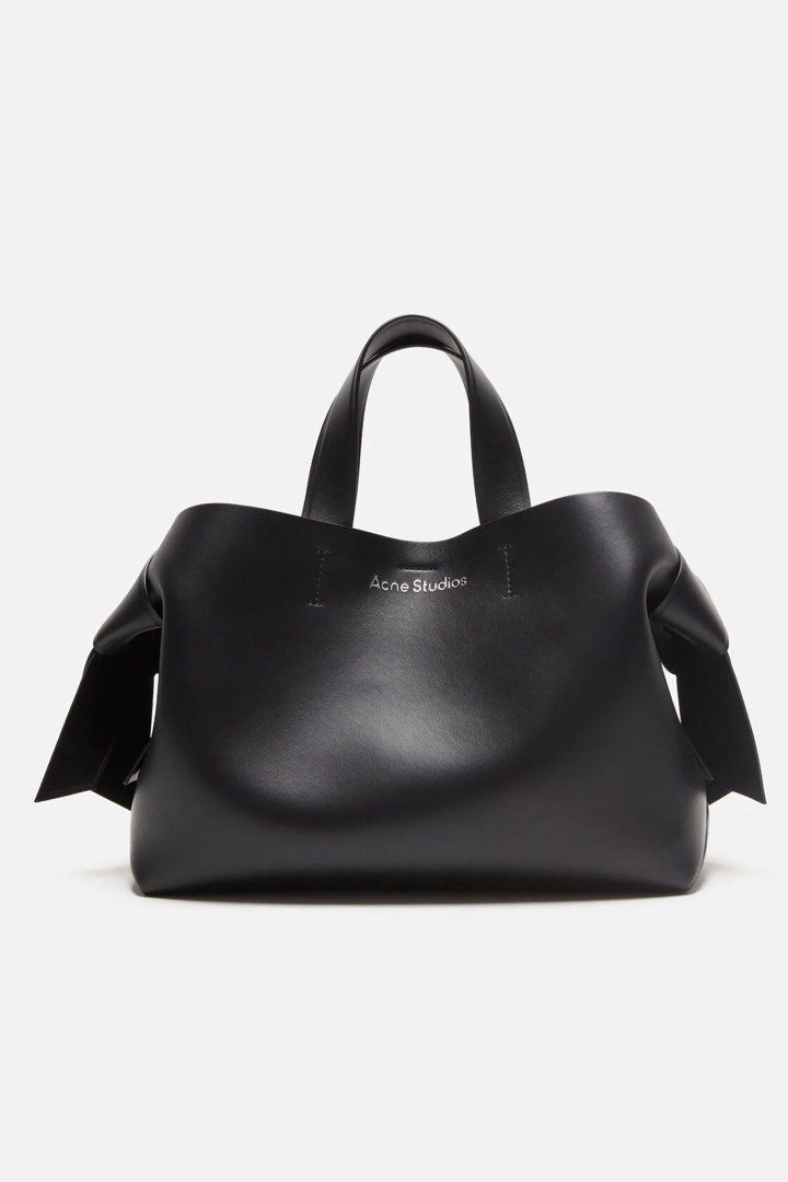 Acne Studios Musubi Tote Bag - Black (Category: Tote Bags) located in Balanga. Submitted by kyleweeee (Listing ID 1464948076, Image 1). Description: Bought this bag from another seller here on Carousell. Selling it as I no longer use it. Please message me if you’d like more photos or details. Nga..
