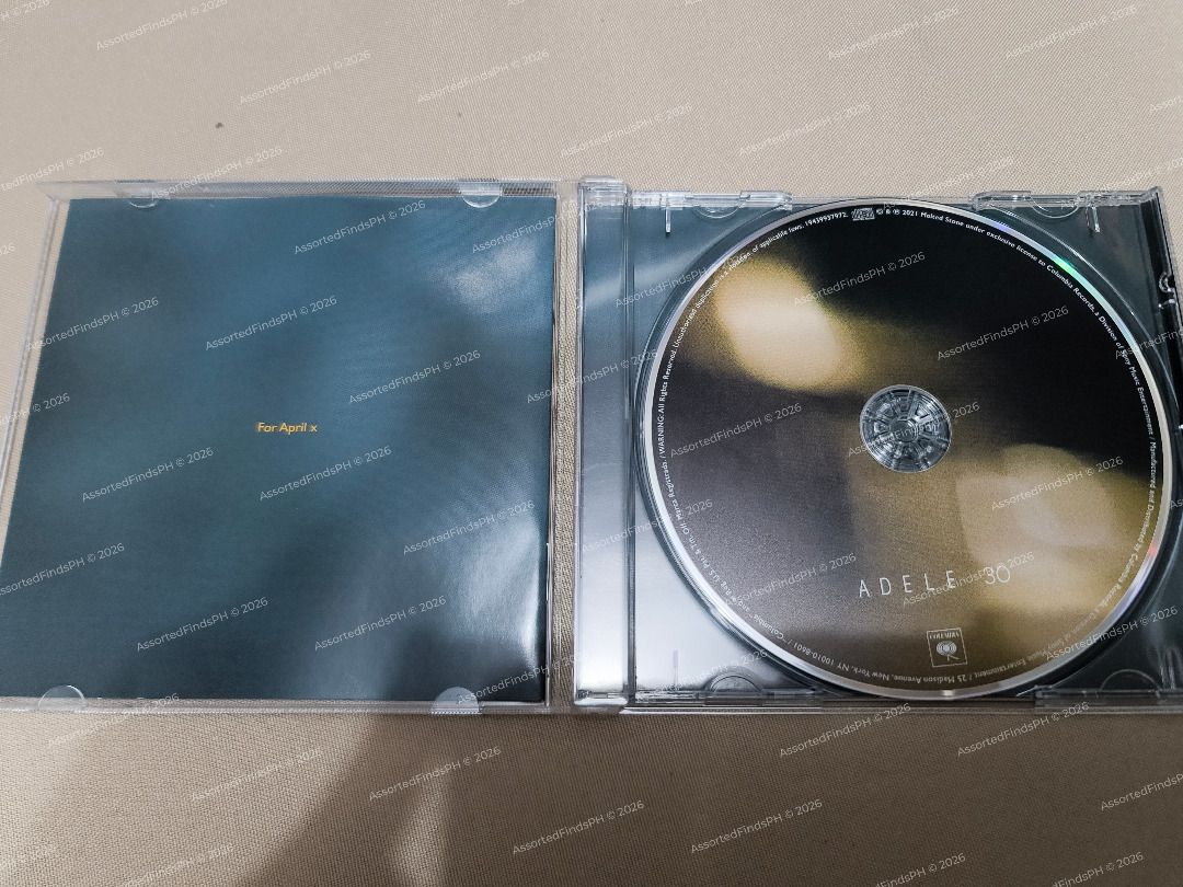 Adele 30 CD (READ DESCRIPTION) (Category: CDs & DVDs) located in Quezon City. Submitted by assortedfindsph (Listing ID 1464967936, Image 3). Description: "Post will be marked as sold once sold." Selling my Adele 30 CD for 300 (FIXED) Firm Price, LP Inquiries will be ignored 💿 Condition: Mint — used once for ripping 🇺🇸 Pressing: US Pressing 🇫🇷 Bought: France during my vacation ⚠️ Honest Issue: The front jewel case was damaged during transit i
