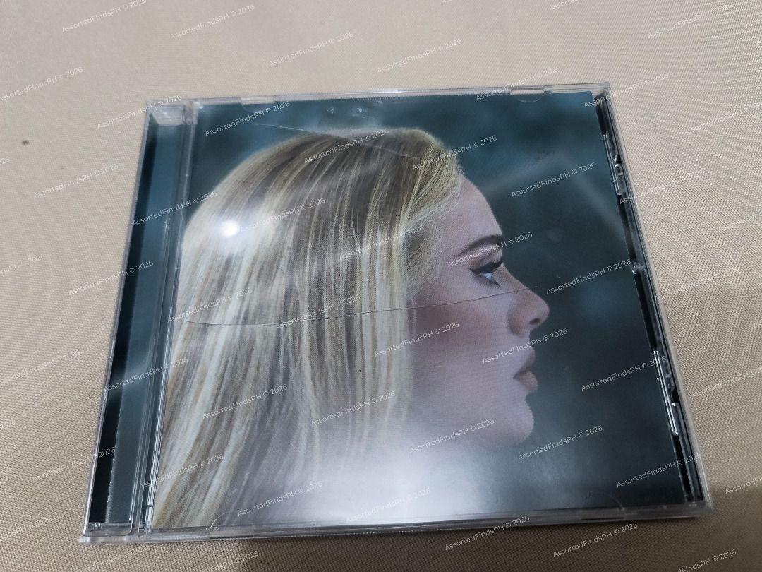 Adele 30 CD (READ DESCRIPTION) (Category: CDs & DVDs) located in Quezon City. Submitted by assortedfindsph (Listing ID 1464967936, Image 1). Description: "Post will be marked as sold once sold." Selling my Adele 30 CD for 300 (FIXED) Firm Price, LP Inquiries will be ignored 💿 Condition: Mint — used once for ripping 🇺🇸 Pressing: US Pressing 🇫🇷 Bought: France during my vacation ⚠️ Honest Issue: The front jewel case was damaged during transit i