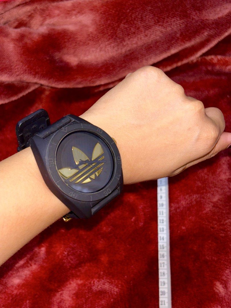 Adidas ADH 2712 Black & Gold Watch (Category: Women's Watches) located in Manila. Submitted by maizhel (Listing ID 1464873331, Image 3). Description: For sale: Adidas original santiago watch from 🇯🇵 for only 3000pesos negotiable, no box, with minimal scratches at tha back signs of usage.. RFS: bawas watch may paparating na namn ksi galing japan Loc: montalban rizal Delivery: lalamove/j&t Mop:gcash - Model: ADH 2712 661302 - Colorway: Striking b