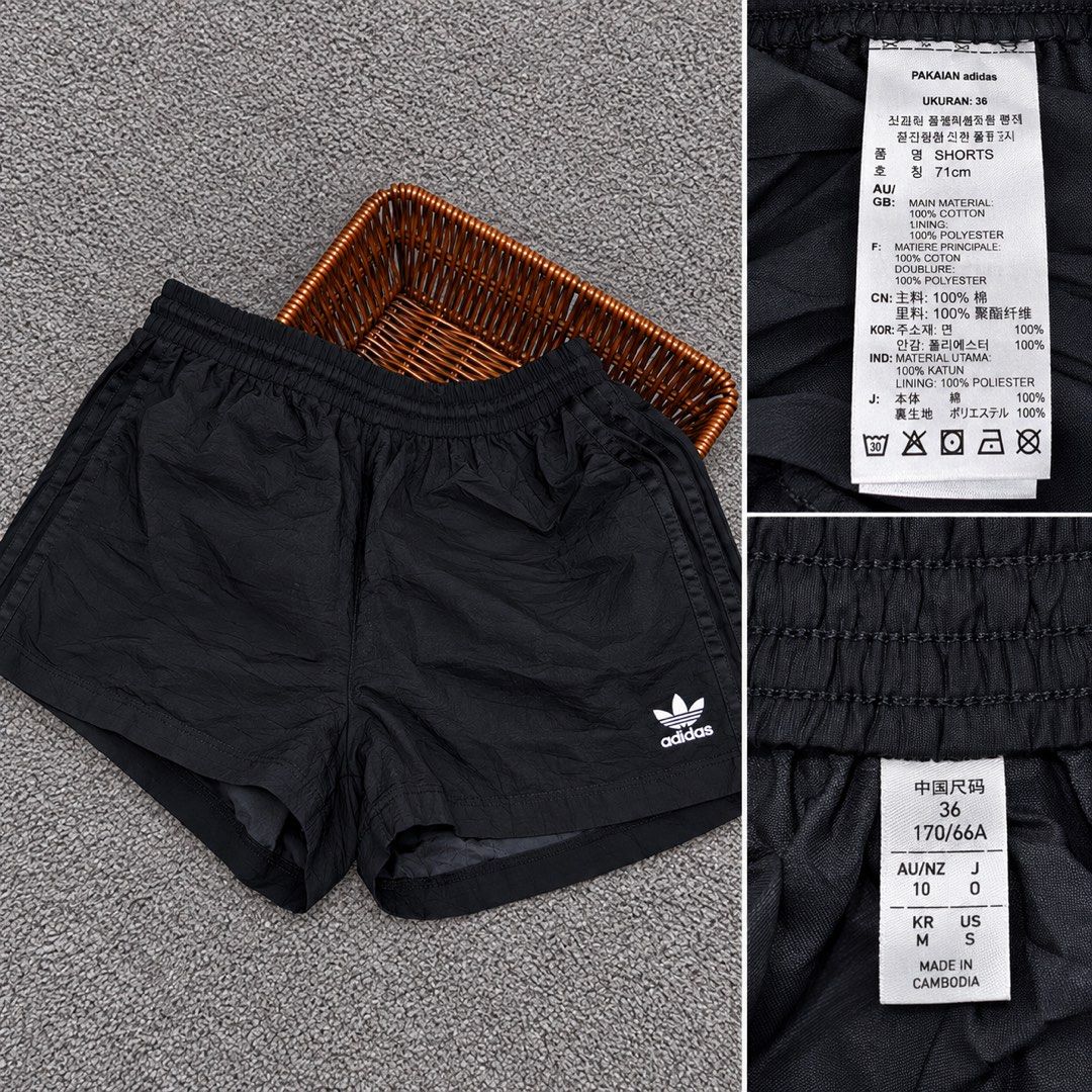 Adidas Black Shorts Size S (Category: Shorts) located in Butuan. Submitted by 3kmhoppers (Listing ID 1464828577, Image 1). Description: - Brand: Adidas - Color: Classic Black with Trefoil logo - Size: 36 / US Small - Material: Lightweight fabric with soft cotton lining - Features: Elastic waistband, standard side pockets - Condition: Clean, minimal design - Best for: Workouts, errands, or casual streetwear - Origin: Made in Cambodia.