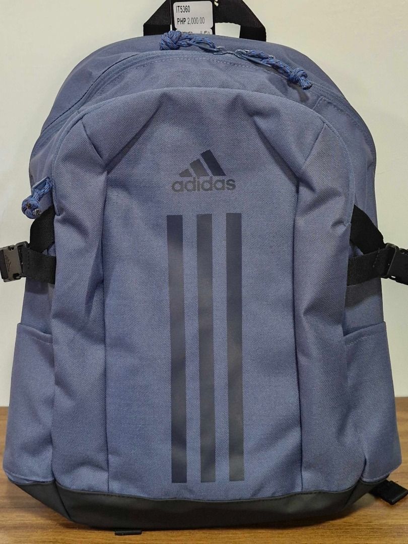 Adidas Blue Backpack (Category: Backpacks) located in Davao. Submitted by j_guitarist (Listing ID 1464967101, Image 2). Description: - 100% Authentic Adidas blue backpack with original tags attached (Price tag: PHP 2,000.00) - Stylish vertical three stripes design on the front - Multiple zippered compartments for organized storage - Side compression straps with durable buckles - Padded mesh back panel and shoulder straps for maximum daily comfort