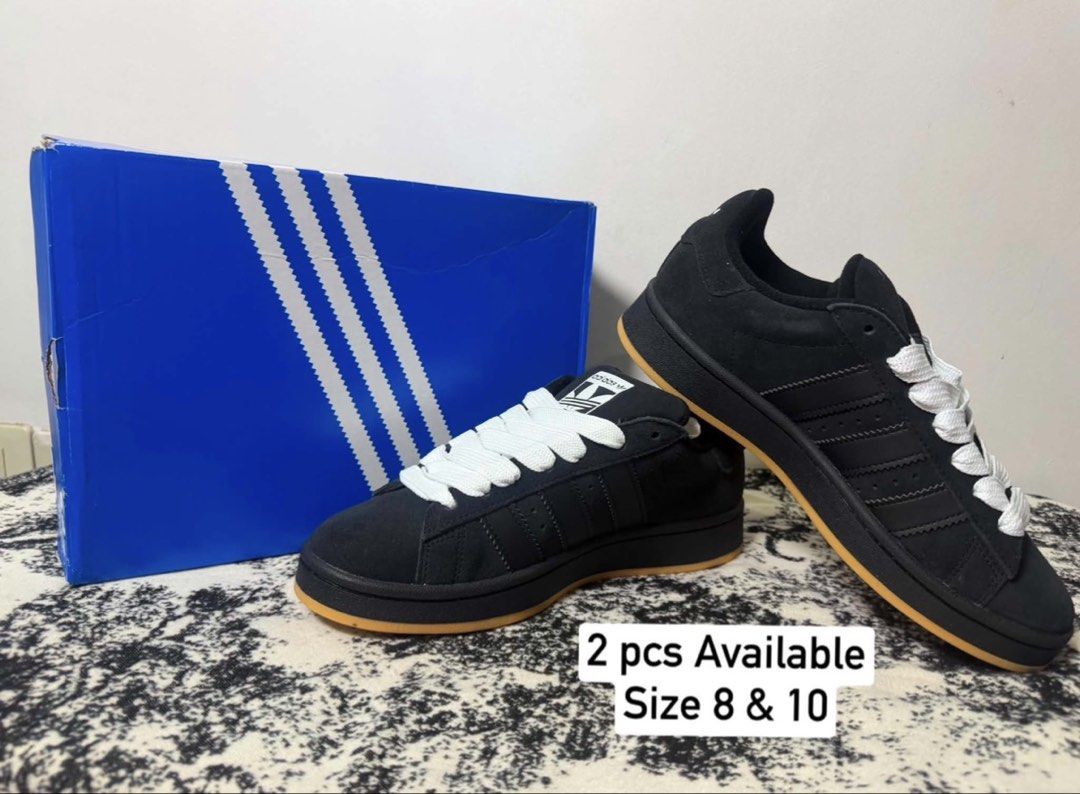 Adidas Campus 00s Black Gum Sole (Category: Sneakers) located in Quezon City. Submitted by imee2112 (Listing ID 1464886918, Image 1). Description: - Brand: Adidas Campus 00s - Colorway: Core Black with Gum Soles - Style: Classic chunky skate shoe with premium suede upper and signature fat laces - Inclusions: Extra pair of white laces and original blue box - Available Sizes: Size 8 and Size 10 (Two pairs total) - Condition: Brand new and 100% auth